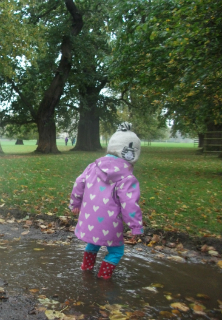 Jumping in a big puddle at Burghley
