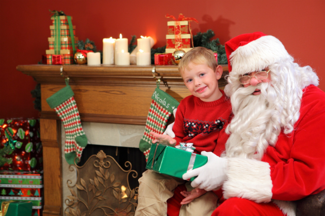 Sitting on Santa's knee. ©iStock.com/morganl