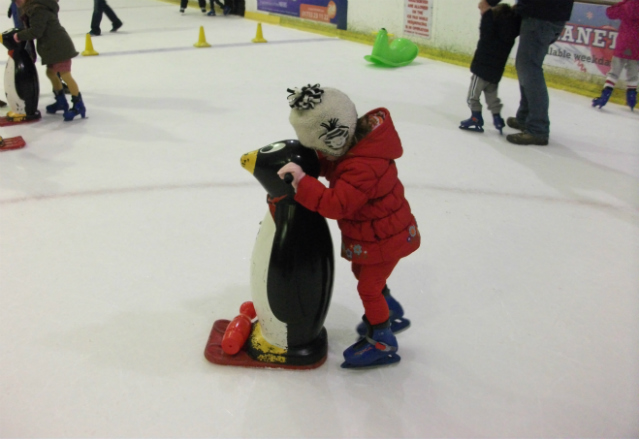 Toddler ice skating
