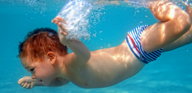 Boy swimming. Image: ©iStock.com/olesiabilkei