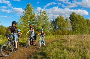 Go cycling with the family. Image: ©iStock.com/JaySi